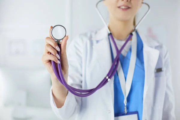 Doctor with stethoscope smiling