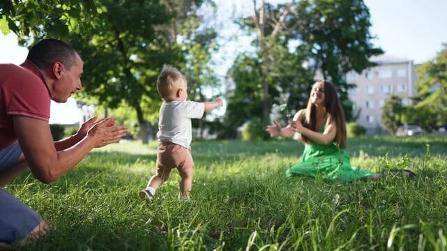 Happy family outdoors in park